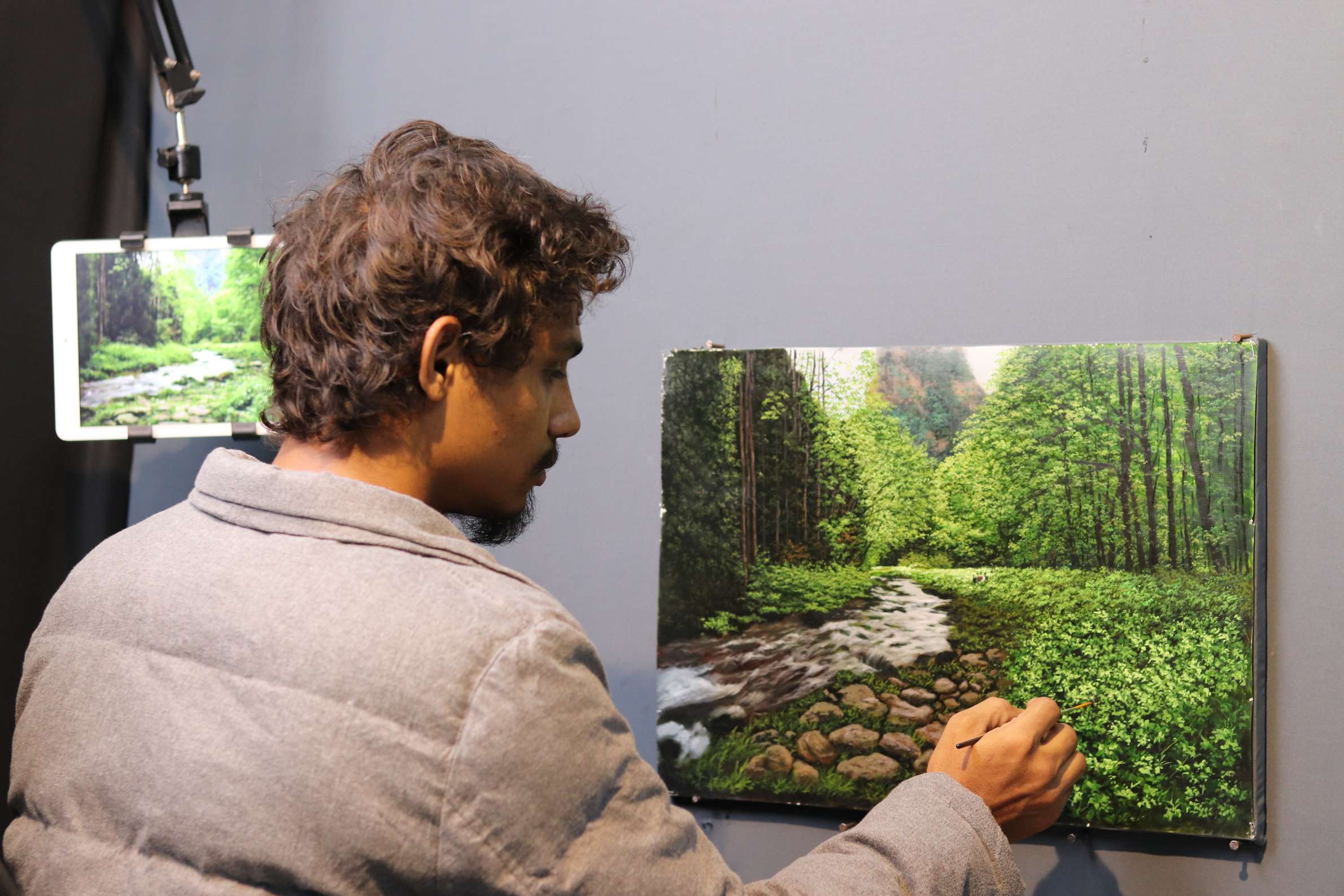 Master Artist Thangaraj painting Verdant Cascade fine art canvas in Mumbai studio