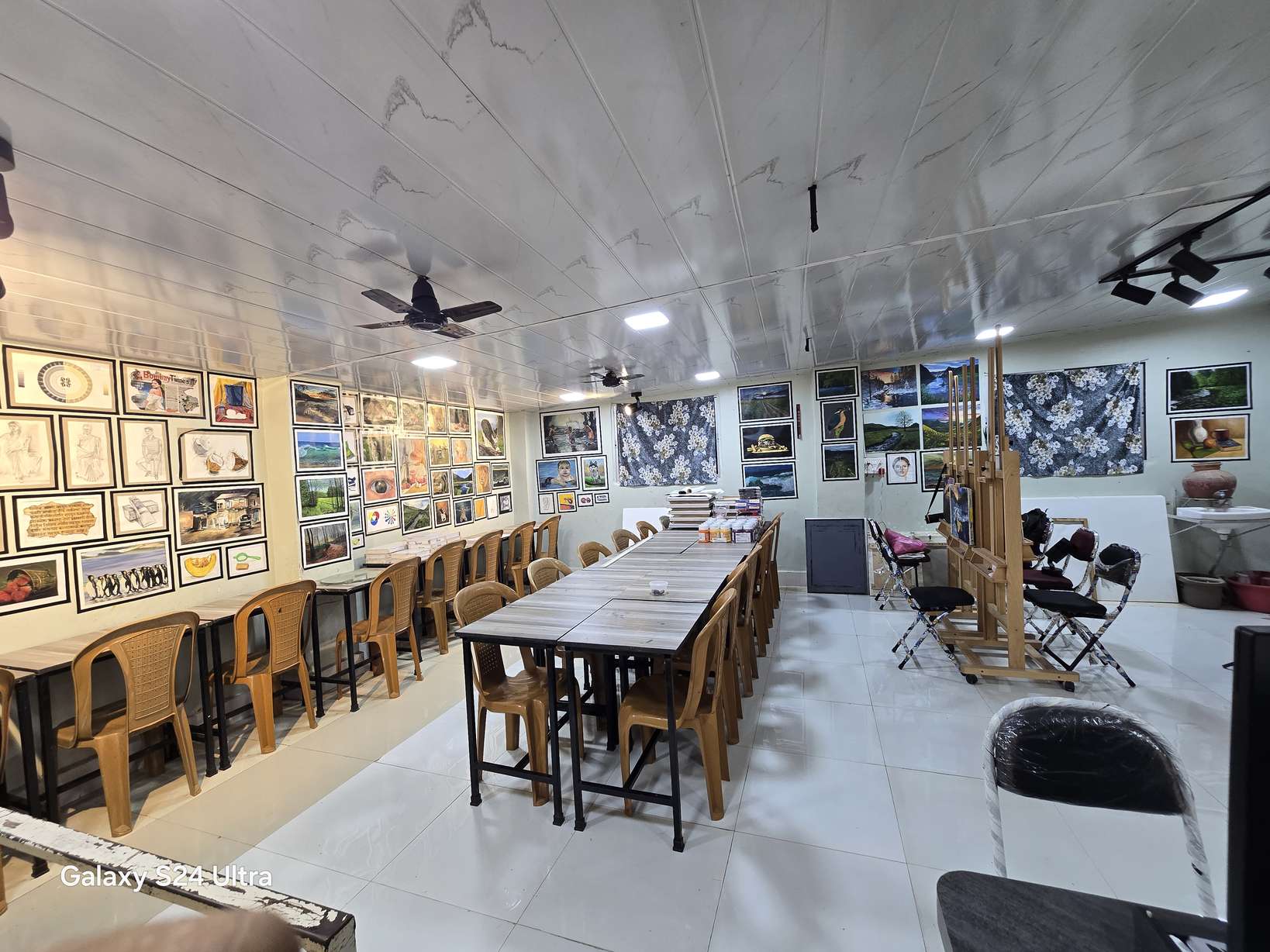 Thangaraj Arts Studio & Art Classroom Atelier Mumbai with wooden easels and artwork